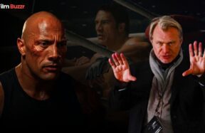 Dwayne Johnson as Mark Kerr in The Smashing Machine, looking intense and emotional in a dark, cinematic MMA setting